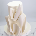 Білий весільний торт з шоколадними твістами
